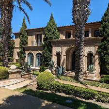 Exterior-house-washing-algae-mold-and-moss-removal-from-exterior-surfaces-in-Pelican-Hill-Newport-Beach-California 1